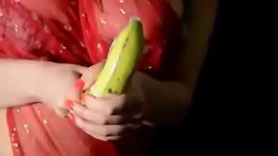 Desi lady playing with kela